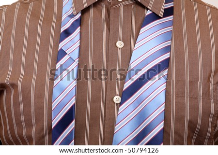 Modern Business. Tie on the shirt close-up. Office Fashion.