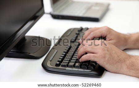 Men Hands on PC Keyboard