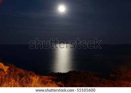Spain Coastline by Night. Sea under Moon