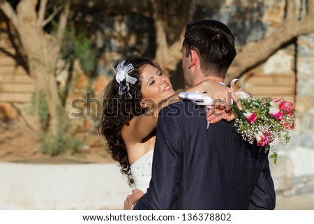Happy young couple dancing their wedding dance
