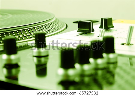 Top-notch equipment for a hip-hop scratch DJ. Turntable and mixer.