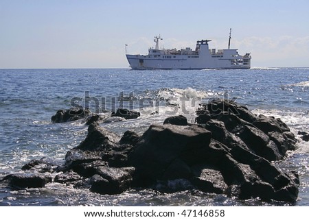ferry-boat on the sea near island Volcano, Lipari Islands, south Italy, Europe