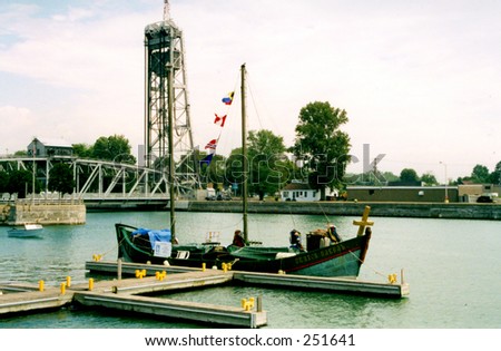 A small sailboat in Canadian harbor - sail-show