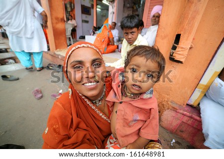Jaipur, India - April, 2013: Portrait Of An Indian Mother And Child