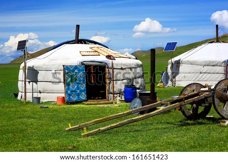 Mongolian ger camps with solar power, TV satellite and oxcart, Central Mongolia. Great contrast, modern and traditional lifestyle melting each other