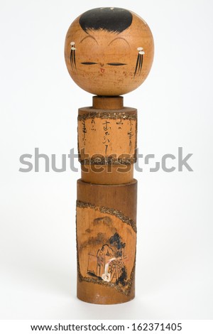 Japanese vintage wooden souvenir - Kokeshi doll (with simple trunk and an enlarged head, lacking of arms or legs)