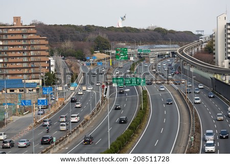 SUITA, JAPAN - MARCH 9: Chugoku Expressway, one of the busiest highways in Japan on March 9, 2014 in Suita. It connects Kansai and Chugoku including major cities of Hiroshima, Kobe, and Osaka.