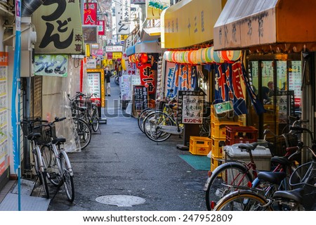 OSAKA - APRIL 21, 2013: Side street at entertainment area of Juso. The area is famous as a location site of movie \