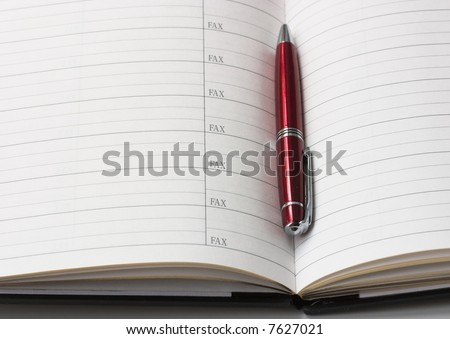 Address book and a pen