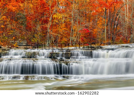 Whitewater Pours Over Rock Ledges At Indiana\'S Upper Cataract Falls With Beautiful, Colorful Fall Foliage.
