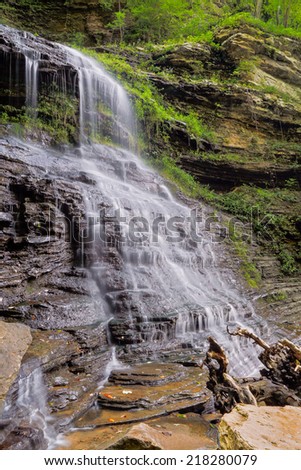 The lower section of Cathedral Falls, a waterfall in West Virginia \'s New River Gorge area, is viewed here from the side.