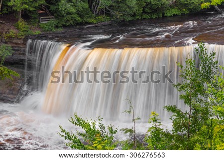 Upper Peninsula Michigan\'s Upper Tahquamenon Falls is the second largest waterfall in the United States east of the Mississippi River.