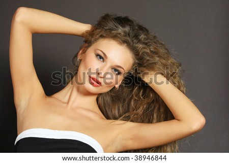 Fashion art photo of beautiful model with long brown hair