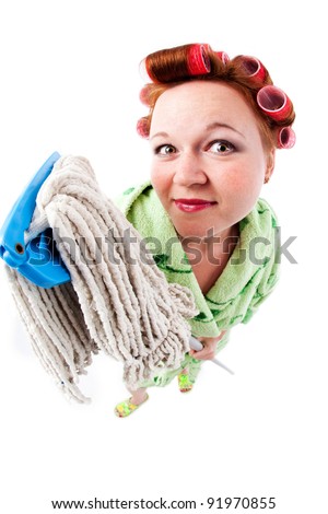 mid-age woman with hair rollers holding swab fish-eye photography