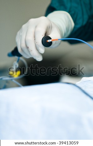 heart surgeon holding device in operating room