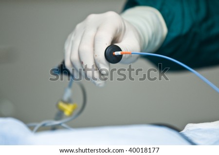 heart surgeon holding device in operating room