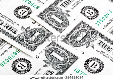 Composition from one U.S. dollar bills close-up end stacked shot.
