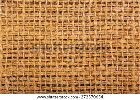 Texture of sacking or hessian or burlap material, gunny sack natural background.