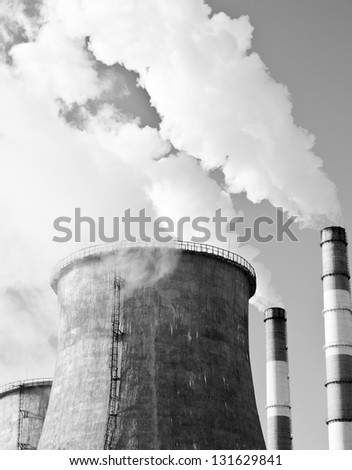 Industrial smoke stack of coal power plant in monochrome