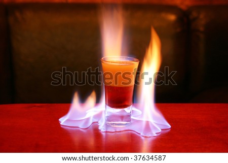 Flaming B-52, the top layer is ignited, producing a blue flame.