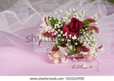 Arrangement with flowers and favors for wedding, baptism and First Communion