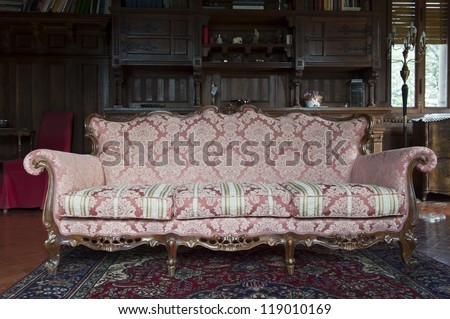 old sofa in the room of a castle