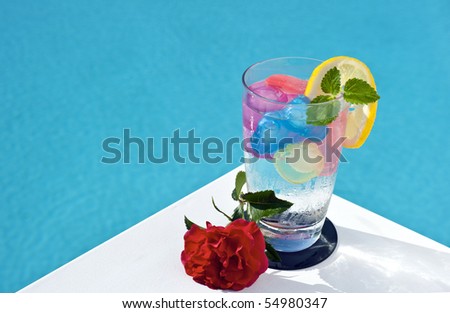 Iced drinks placed on board a private pool.