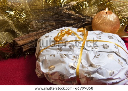 Christmas decorations and cake wrapped with a red background