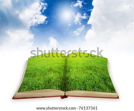 book with green landscape on pages. Magic book concept