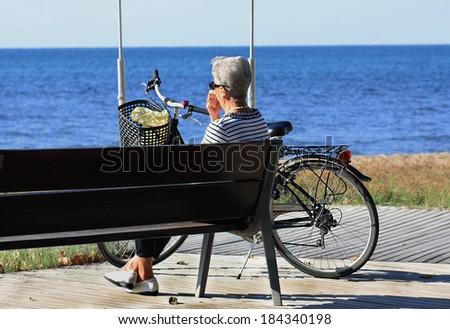 Elderly women with  bike