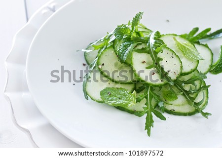 Green salad of cucumber and rocket