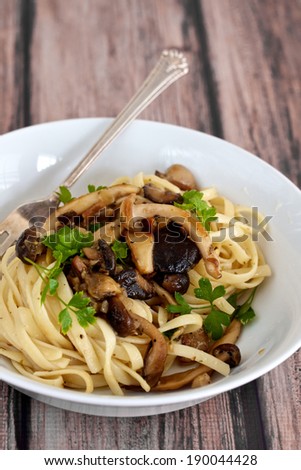 Mushroom Pasta on wooden table