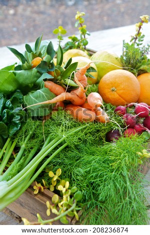 Box of organic fruit and vegetables from the market