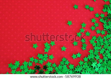 green stars clipart. stock photo : Green stars on red background for Christmas