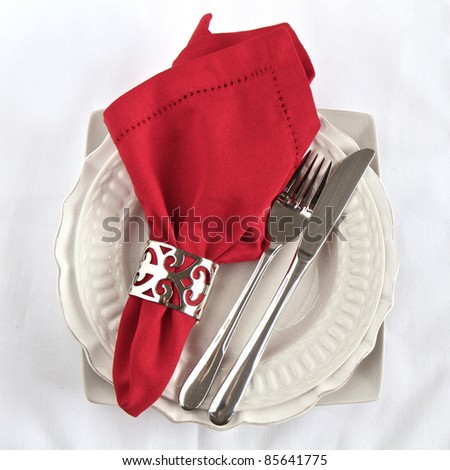table setting with a red