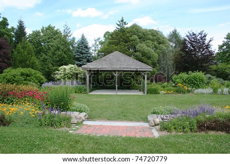 stock photo Colorful garden with wedding pavilion