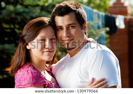 Happy couple outside on a sunny day