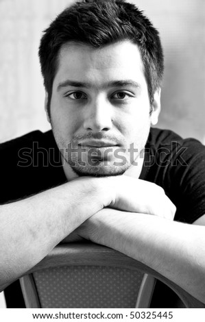 Naturally lid black and white portrait of a young man