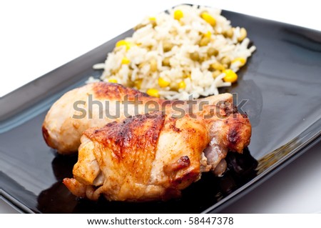 chicken and rice mixed with peas and corn isolated