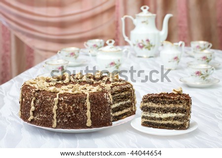 poppy cake with coffee cream sprinkled with grated chocolate