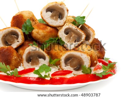 meat balls chicken fillet stuffed with mushrooms, a side dish of rice with red pepper isolated on white