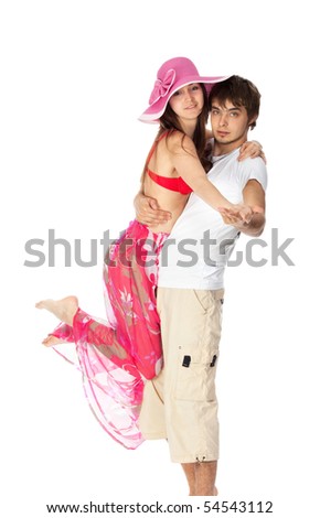 stock photo : young happy couple dancing in their beach clothes isolated on white