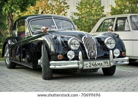 MOSCOW - JULY 31: Black Jaguar XK120 Classic on exhibition parking at an annual event the VI race of vintage cars \'Night Moscow Classic Rally\'. July 31, 2010 in Moscow, Russia