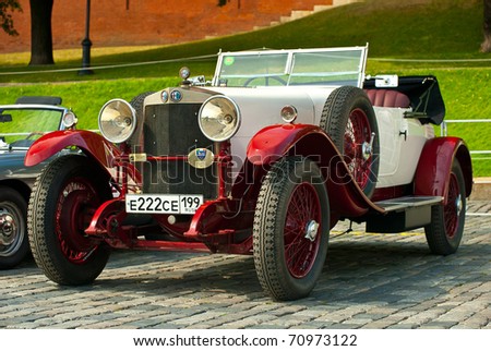 MOSCOW,RUSSIA-JULY 10: Red-Withe alfa romeo 24HP on display at the start annual Rally of classical cars  \