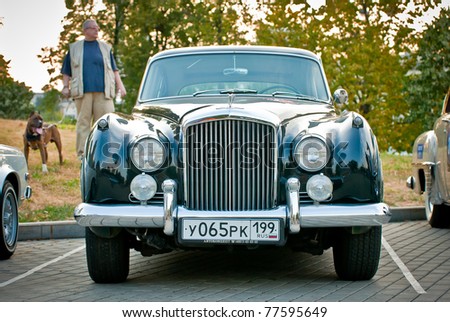 stock photo MOSCOW JULY 31 Bentley Black Claccic on exhibition parking 