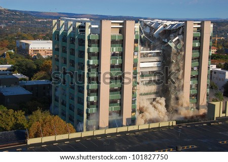 Building demolition by implosion - image 4 of a 10 shot sequence