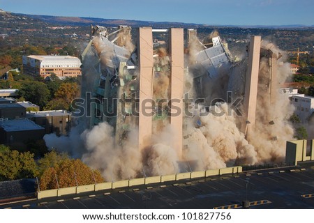 Building demolition by implosion - image 7 of a 10 shot sequence