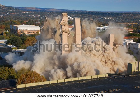 Building demolition by implosion - image 9 of a 10 shot sequence