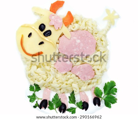 creative vegetable food meal with spaghetti cow form