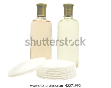 cosmetics colognes and cotton pads isolated
